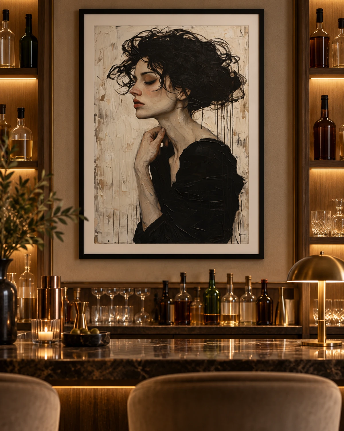 A large black-framed portrait print behind a lamp-lit hotel bar.